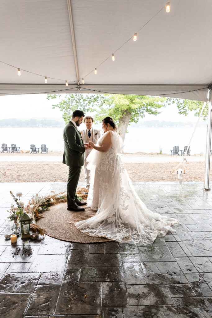 Bride and groom first look inside Tudor House on Portage Lakes before the ceremony