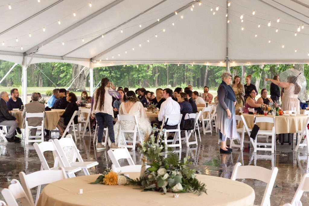 Highlights from Kylie and Jarred’s Tudor House wedding on Portage Lakes — laughter, umbrellas, and lakeside moments