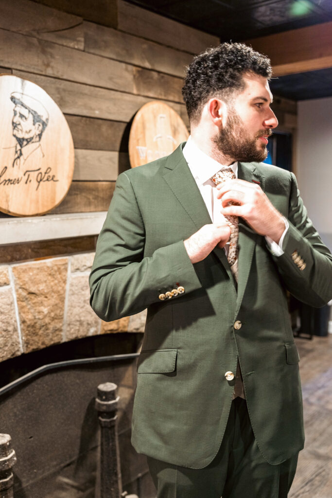 Highlights from Kylie and Jarred’s Tudor House wedding on Portage Lakes — laughter, umbrellas, and lakeside moments