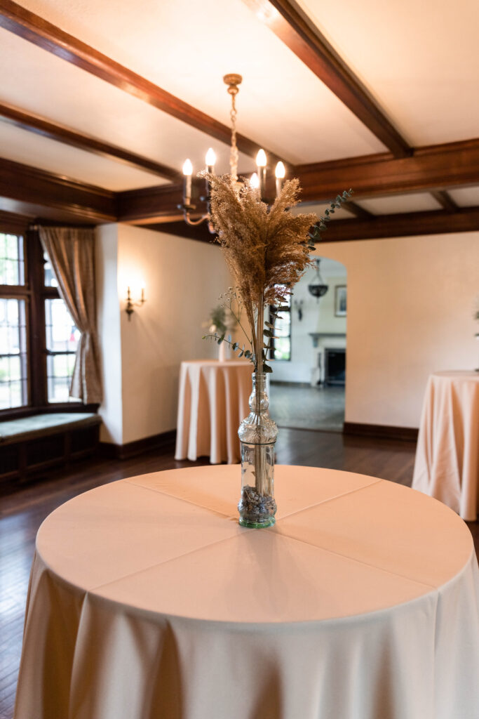 Highlights from Kylie and Jarred’s Tudor House wedding on Portage Lakes — laughter, umbrellas, and lakeside moments