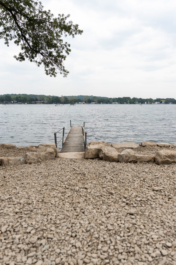Highlights from Kylie and Jarred’s Tudor House wedding on Portage Lakes — laughter, umbrellas, and lakeside moments